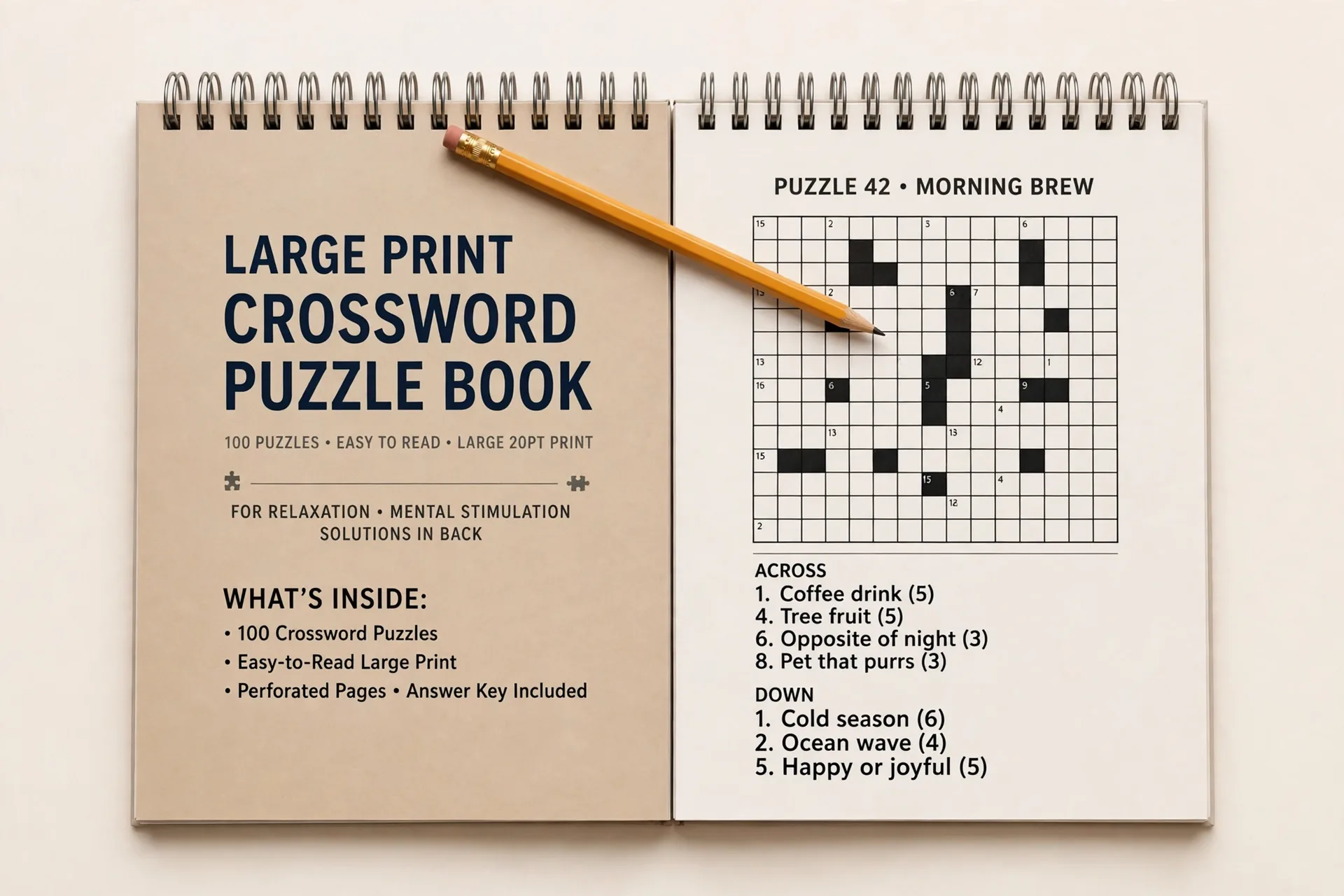 AARP large print crossword puzzles spiral-bound book with a pencil